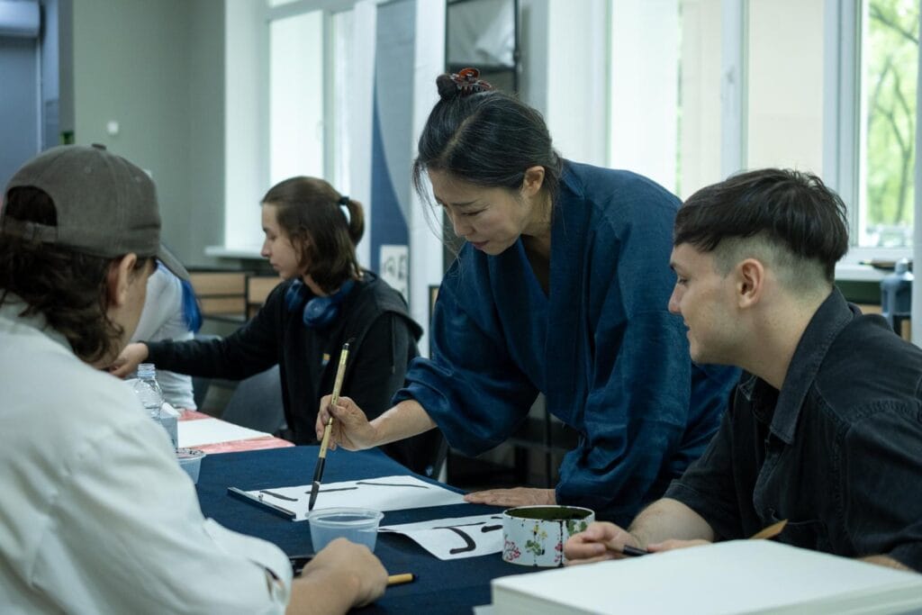Keisho Nishina teaching students